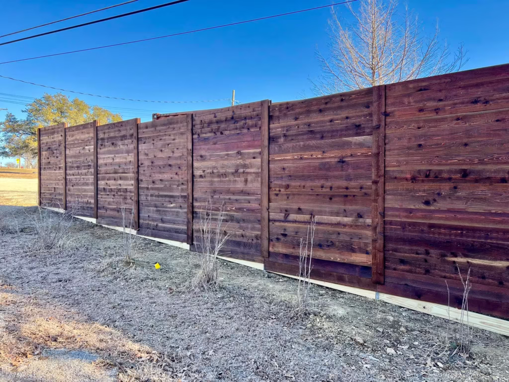Wooden privacy fence installed by Mallard Fence & Construction